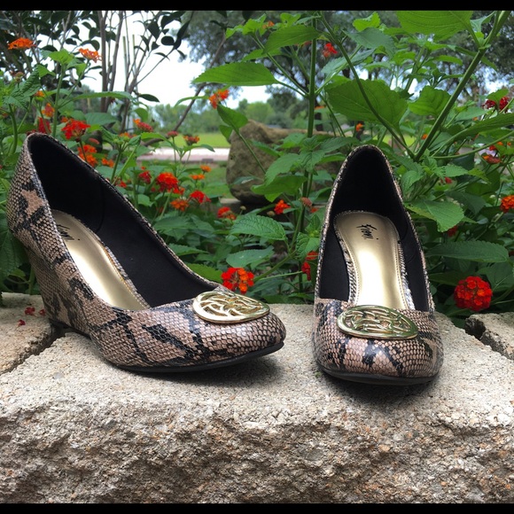 Fiomi Shoes - Snake skin wedge heels.